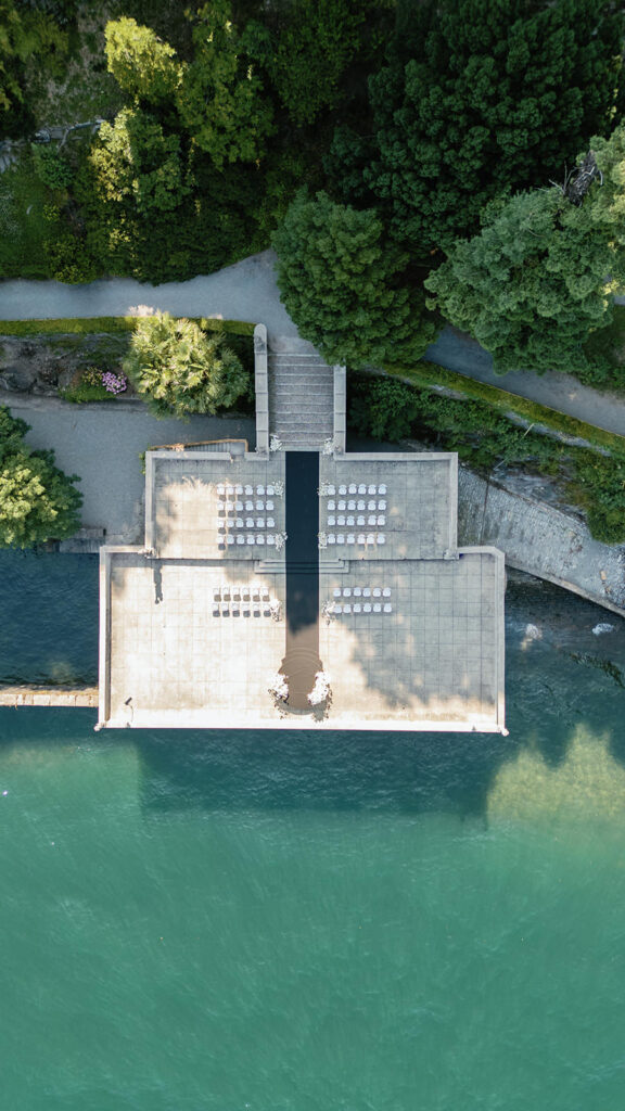 Aerial view of Villa Pizzo wedding venue terrace extending over Lake Como, Italy.